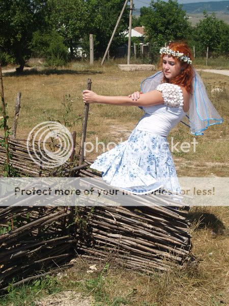 http://i54.photobucket.com/albums/g98/Vedmochka_kat/Our_wedding/wed_w_16.jpg
